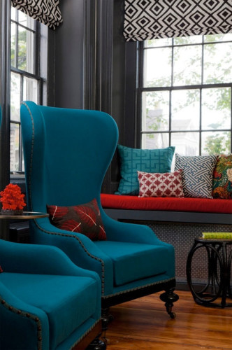 Although not quite my style, the teal and red are fabulous against the dark gray background. 