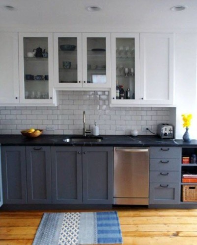 Apartment Therapy featured the full renovation of Dan Bailey's Boston kitchen last year. As it turns out, there are a few things here that we will likely be using in our kitchen, including the cabinet style, black soapstone counters, and yes... Subway tile. 