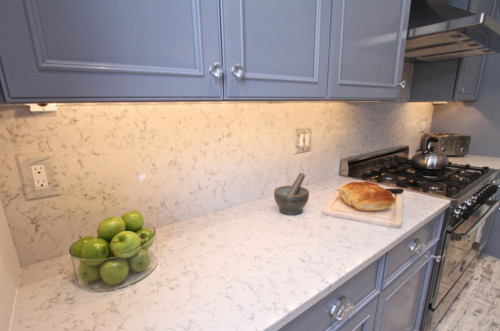 Quartz countertops can be beautiful as in the example of Silestone Lyra, which looks a lot like marble (but not quite).