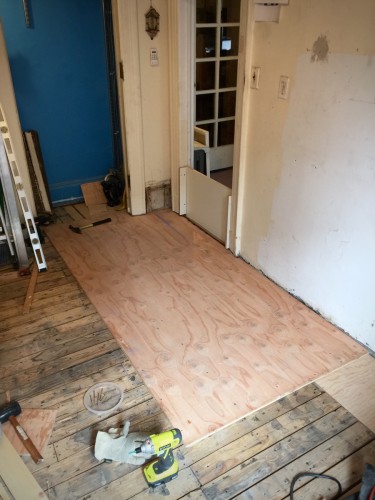 The first piece of subfloor is the most critical, which is why it took several hours cutting and fitting just right.
