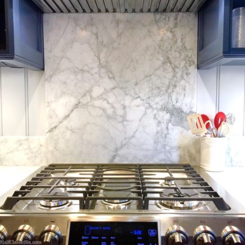 We chose the busiest part of the large slab of marble for the section behind the stovetop. Fortunately, they were able to cut the rest of the pieces needed from the area around this section.